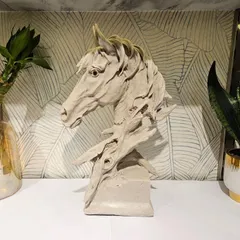 Make a statement with this exquisite stone-finished horse sculpture. This piece of resin art adds a touch of sophistication and power to your living room or office decor.