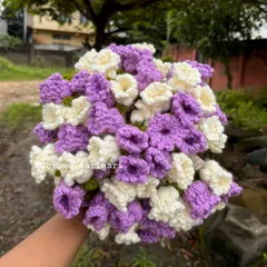 The full "bouquet" view of our crochet baby blanket. It looks like a stunning floral arrangement but is actually a cozy blanket, making it a truly unique and memorable baby shower gift.