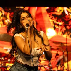 Lost in the music during a high-energy song. The dynamic stage lighting and background visuals added so much to the performance at the Terai Bazaar festival.