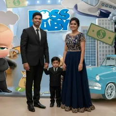 Here's a picture-perfect family moment at a Boss Baby themed birthday. I love creating scenes where the guests of honor, big and small, can become part of their favorite story.