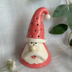 This cheerful Santa tealight holder will cast a warm, festive glow in your home. The light flickers through the small holes in his hat, creating a magical effect.