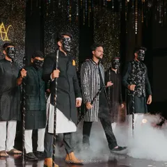 A dramatic entrance for the groom's solo performance. We used masks, props, and smoke effects to build suspense and create a powerful start to his act.