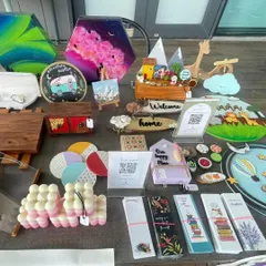 A close-up of my stall setup, showcasing the variety of items I create. From nameplates and kids' decor to candles and jewelry boxes, there's a little piece of handmade happiness for everyone.