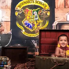 A magical moment from our Harry Potter themed shoot. This little wizard is having a great time popping out of a trunk, ready to cast a spell.