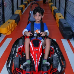 This young racer is focused and ready for the track. Our go-karts provide a real sense of independence and adventure for kids.