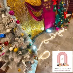 For a high-energy New Year's Eve party, I designed this glamorous setup. The shimmering gold sequin wall, festive Christmas trees, and bright lights created the perfect backdrop for a memorable celebration to welcome the new year.