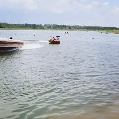 The excitement of a speedboat ride at Yagachi. This is one of the thrilling water sports activities we include in our Chikmagalur itinerary.