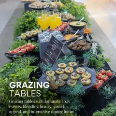 Grazing tables are more than just food; they are an interactive dining experience. This setup, lush with greenery, showcases how we blend luxury and visual appeal for an unforgettable gourmet journey.