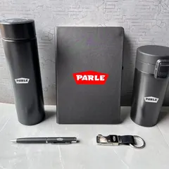 The items from the Parle corporate gift set displayed outside the box. You can see the consistent branding across the temperature flask, diary, travel mug, pen, and keychain.