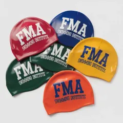 A colorful assortment of our FMA swimming caps. We provide high-quality silicone caps in various colors, available for all students at our institute.