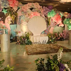Welcome to our enchanting underwater kingdom! This mermaid-themed first birthday was a deep dive into detail, with a grand seashell throne, shimmering floors, and an ocean of balloons. I love creating these magical, immersive worlds for little ones.