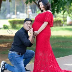 A playful and loving gesture from the dad-to-be. This classic pose is always full of so much joy and anticipation, perfectly capturing the excitement of meeting the little one.