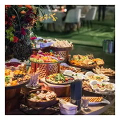A feast for the eyes and the palate. Our bountiful grazing tables are artfully arranged with a lavish selection of international cheeses, charcuterie, fresh fruits, artisanal breads, and dips, creating a stunning centerpiece for social gatherings.