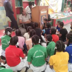 Mr. Ramesh Bansal Ji speaking to a group of schoolgirls about the importance of self-defense. We focus on providing practical advice and building confidence.