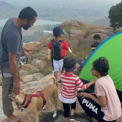 Our community often gathers for outdoor trips, blending climbing with camping and connecting with nature. Here, our facilitator Akshay shares a moment with fellow adventurers on a weekend camp.