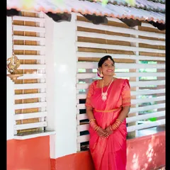 A full view of the bride's stunning Muhurtham look. The makeup is balanced to look beautiful in natural light, enhancing her features without overpowering her traditional attire and jewelry.