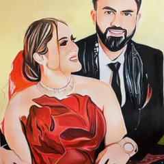 A completed 16x23 inch custom portrait of a couple. The vibrant red dress and the warm background were chosen to create a romantic and celebratory feel, perfect for an anniversary or wedding gift.