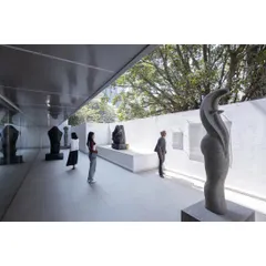 The sculpture court at MAP, a transitional space between the interior galleries and the city. We designed this area to be a quiet, contemplative zone, using natural light and a simple material palette to highlight the art and create a serene public experience.