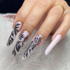 This is the level of artistry you can achieve. We teach advanced techniques like the Russian Edge, focusing on precise shaping and intricate freehand designs that will set you apart as a nail technician.