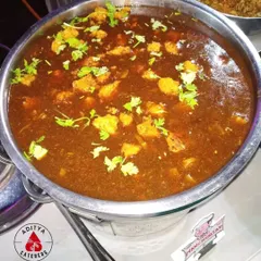 This is our signature Veg Manchurian gravy. Soft vegetable balls are simmered in a savoury and tangy soy-based sauce, garnished with fresh coriander. It's the perfect partner for fried rice or noodles.