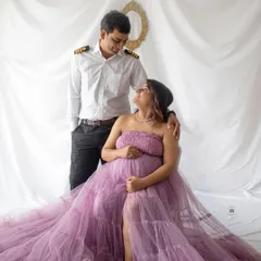 A lovely couple's maternity portrait. The way they look at each other shows all the love and anticipation for their little one's arrival.