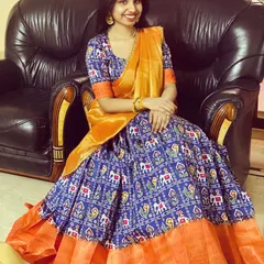 The gorgeous Monisha in a custom-made half saree. I used a traditional Patola print for the lehenga and paired it with a contrasting orange border and dupatta for a vibrant, festive look.