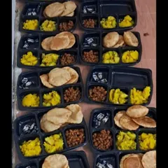 We can handle large-scale orders for festival celebrations. Here are dozens of our packed thalis ready for delivery during Ganesh Chaturthi, all prepared without onion or garlic.