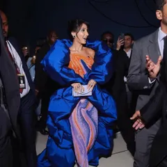 For Nora Fatehi's main IIFA 2023 appearance, we went for high drama with this structural Jean-Pierre Khoury gown. The voluminous royal blue wrap over a psychedelic-print catsuit was a bold fashion choice that truly owned the carpet.