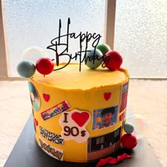 A full view of the 90s throwback cake. It's a perfect, personalized theme for anyone who grew up in that awesome decade.