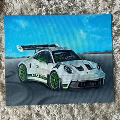 The finished acrylic painting of the Porsche GT3 RS, showing the tire marks on the asphalt and the clear blue sky. I'm always open for car painting commissions.