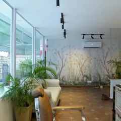 Another view of our calm and inviting waiting area. I want you to feel relaxed from the moment you arrive, surrounded by a soothing atmosphere that prepares you for your treatment.