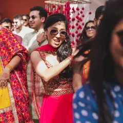Here I am, dancing right alongside the bride's team during their surprise performance. I believe in being part of the energy, guiding the group and making sure the vibe stays high from the first step to the last.