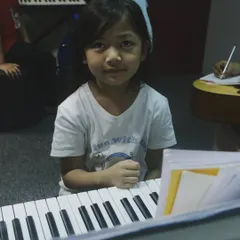 One of our youngest students at the keyboard. We start with the basics and make learning fun and engaging for children as young as five.