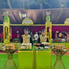 My chefs at the Mughlai counter, ready to serve a variety of rich and flavorful traditional dishes.