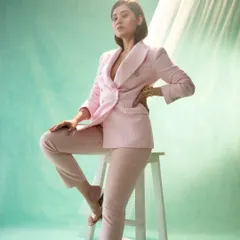 A powerful and chic look in a pink pantsuit for my Femina editorial. This photo showcases my versatility in portraying different styles, from elegant gowns to sharp, modern business attire.