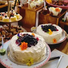 A glimpse into our dessert artistry with two stunning blueberry cakes. Topped with fresh berries and edible flowers, these cakes demonstrate our commitment to creating desserts that are as beautiful as they are delicious.