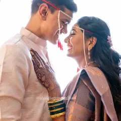 A sweet moment captured during the Simantpoojan ceremony. I also offer grooming services for the groom to ensure the couple looks picture-perfect together.