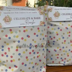 "Celebrate & Bake" party favors from a pizza-making birthday party. This shows how I create a cohesive experience, from the activity itself to the thank-you gifts for the little chefs.