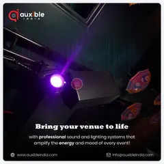 We bring venues to life by amplifying energy and mood. This image shows a professional moving head light fixture and a line array speaker working in tandem to create a focused, high-energy spot on the dance floor.