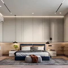 A master bedroom featuring a full wall of seamless, handle-free wardrobes that blend into the wall. The design includes a wood-paneled headboard wall with suspended nightstands and stylish pendant lights.