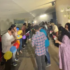 A balloon-based team-building game in full swing for the Hindustan Unilever tax team. These activities are designed to be simple, inclusive, and incredibly effective at getting people to work together and laugh.