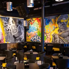 This is a full interior I blasted for a restaurant in Parel, Mumbai. I work with brands and businesses to create a specific vibe, whether it's raw street energy or something more polished. I make spaces unforgettable.