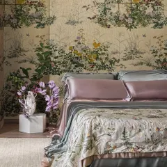 The 'Scenic Flora' wallpaper tells a poetic story of Japanese wildflowers, turning this bedroom into a romantic masterpiece. The design, paired with luxurious silk bedding, creates an environment of pure elegance and tranquility.