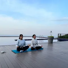 As a mother-daughter duo, we guide you together. Our shared practice, set against the serene backdrop of the Dharamshala mountains, reflects our belief in yoga as a lifelong journey of connection.