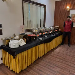 A full buffet line ready for service. Our team ensures the setup is clean, organized, and fully stocked before your guests arrive.
