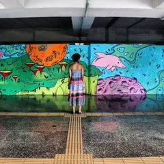 Standing in front of the massive mural I created for the Mumbai Metro. Projects like these are about more than just beautification; they are about bringing art to thousands of daily commuters, turning a mundane journey into a moment of curiosity and wonder. This is public art that becomes part of the city's story.