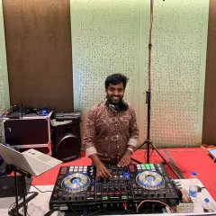 A smile for the camera from behind my Pioneer console. I truly believe life is beautiful, and I try to share that feeling through my music at every single event.