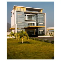 The Admin Block at Krishna Sai Granites stands as a testament to our belief that industrial architecture can be dramatic. The facade features extensive use of engineered glass, a 32-foot cable-stayed entrance porch, and accents of Aluminum Composite Panels (ACP).