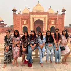 Our students sit before the magnificent Taj Mahal. This trip provided them with a memorable experience of visiting one of the 7 wonders of the world and learning about its historical significance.