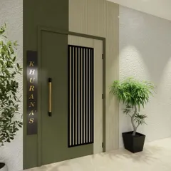 This is another take on a modern entryway, featuring a two-tone design with an olive green door and a beige fluted panel. The vertical grill on the door adds a textural element, while the backlit nameplate provides a touch of luxury.